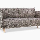 Himanka-vuodesohvassa yhdistyvät ylellinen pehmeys ja moderni design. Ruskeavalkoinen ja mustavalkoinen Wildlife-verhoilukangas tuo sohvaan hienostuneen ilmeen ja nostaa arjen mukavuuden uudelle tasolle.