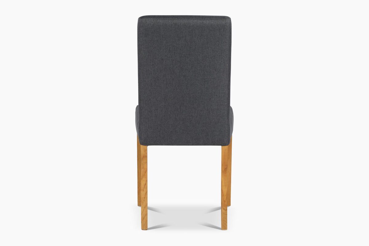 Saimaa_harmaa_ruskea3 Tyylikäs, mutta käytännöllinen Saimaa-hupputuoli on kiinteästi verhoiltu harmaalla polyester-kankaalla. Tuolin jalkavaihtoehdoista voi valita öljytyn tammen tai mustaksi maalatun pyökin.